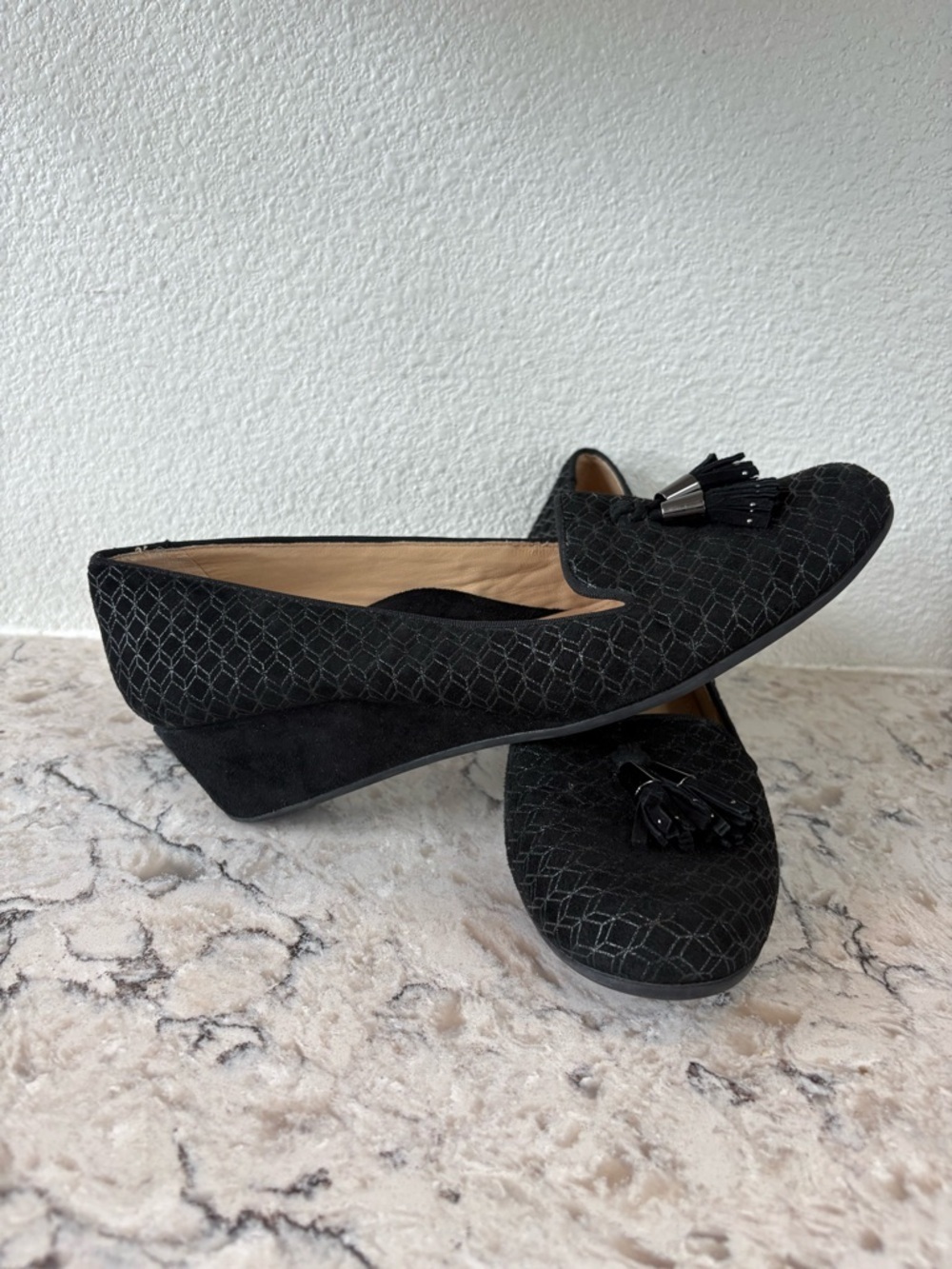 Nurture Black Tassel Wedge Loafers with Subtle Geometric Texture